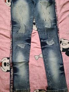 Distressed Blue Jeans with Side Stripe