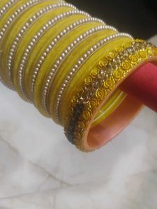 Vibrant Yellow Bangle Set with Gold Embellishments