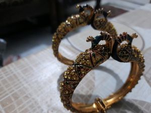 like new golden colour peacock design