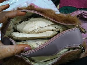 brown fur sling bag