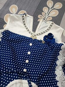Adorable Blue Polka Dot Dress with Embellishments