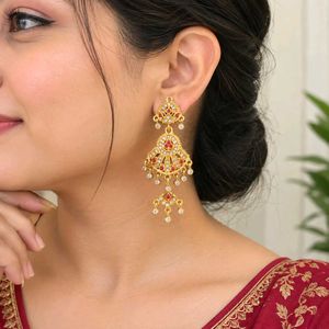 Traditional Gold Tone Earrings with Red Stones