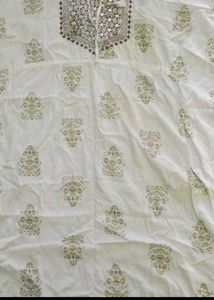 Elegant Cream Kurta Set with Tassels