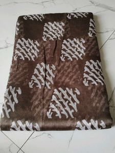 Brown Printed Saree with Gold Border