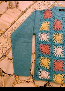 27. Crocheted Granny Square Sweater