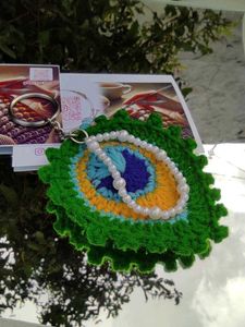 Crochet Peacock feather keychain with pearl