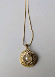Elegant Gold Tone Pendant