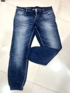 Men's Blue Distressed Denim Jogger Jeans