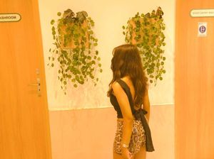 cider backless black top with boat neck.