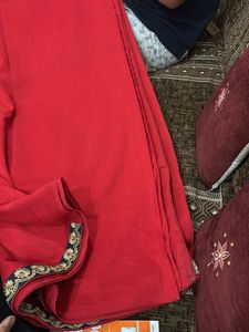 Elegant Red Saree with Floral Border