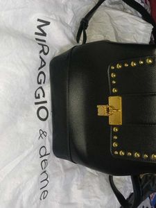MIRAGGIO Stylish Black Backpack with Gold Studs