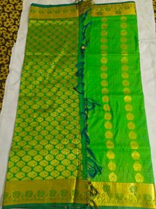 Vibrant Green Silk Saree with Gold Border