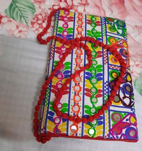 Combo Of Embroidered Sling Bag And  Zari  Potli
