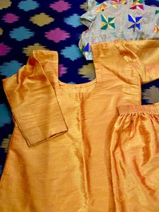 Musturd colour suit with fulkari dupatta