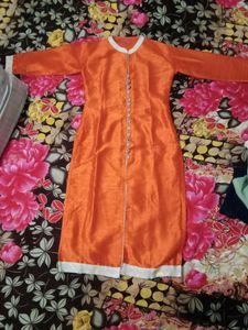 Orange Color Party Wear Front Slit Kurti