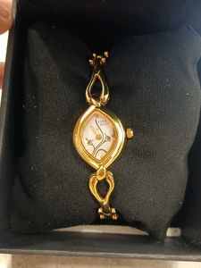 Elegant Gold Tone Titan raga Watch