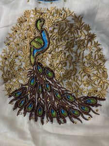 Elegant White Kurta with Peacock Embroidery