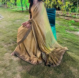 Elegant Golden Saree with Embellished Border