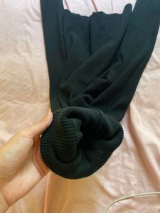 Black Ribbed Turtleneck Sweater