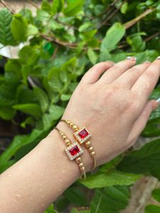 Elegant Gold Bangles with Red Stones