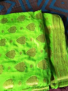 Vibrant Green Saree with Golden Motifs