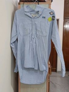 Light Blue Button-Up Shirt with Patches
