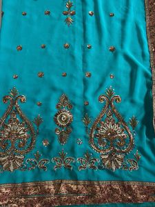 Teal Saree with Gold Embellishments