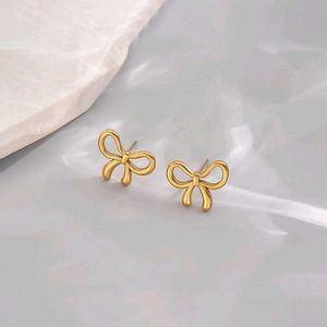 Pintresty Gold Bow Stud Earrings