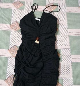 Sleek Black Ruched Mini Dress