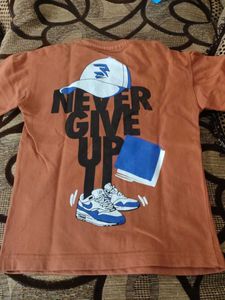Orange Graphic T-Shirt and black pant