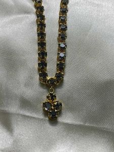 Elegant Gold Chain with Dark Stones