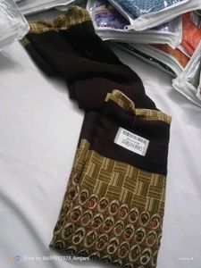 Elegant Brown Saree with Unique Border
