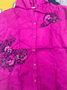 pink sleeveless shirt with cap