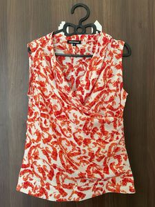 Stylish Orange &amp; White Print Sleeveless Top