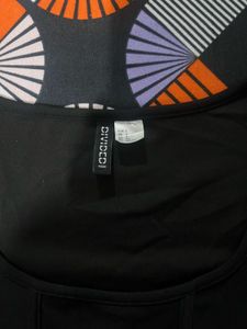 H&amp;M black fitted corset style ribbed top