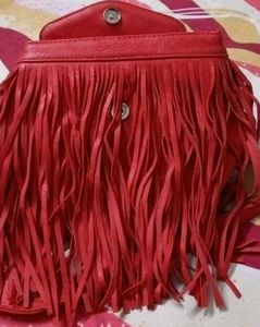 Chic Red Handbag with Gold Accent Handle