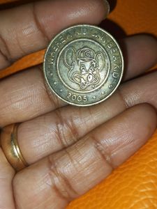 Rare Coin United States (USA) Arcade Token - Chuck E Cheese with letter "C" on the hat 2005 Where A Kid Can Be A Kid