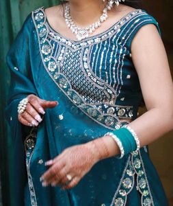 Stunning Teal Embroidered Lehenga Choli