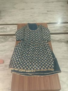 newly sharara suit with embroidery and stars work and also duptta work with lase
