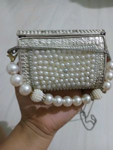 Elegant Pearl Embellished Clutch from Snatcher