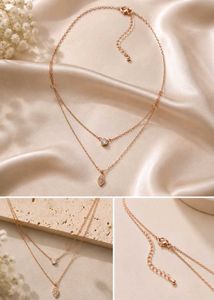 Delicate gold flower and 2 step necklace