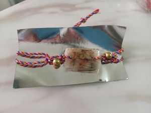 floral resin rakhi in rectangle shape