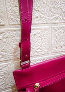 leather cut out sling bag