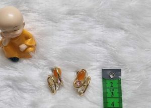 Elegant Gold Tone Earrings with Orange Stones