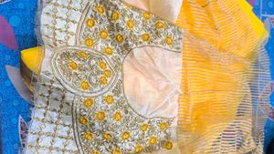 Yellow Saree with Embroidered Blouse