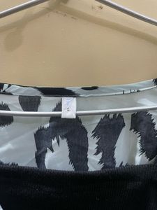 ELEGANT PRINTED TOP WITH FLARED RUFFLE SLEEVES