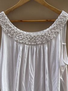 White Sleeveless Top with Embellished Neckline