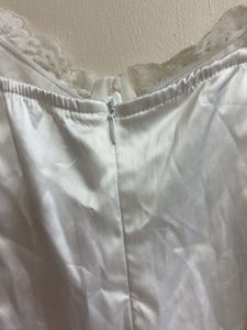 Elegant White Satin Bodysuit with Lace