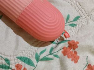Pink Face Roller Massager