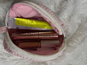 Assorted Lip Glosses and Makeup Bag